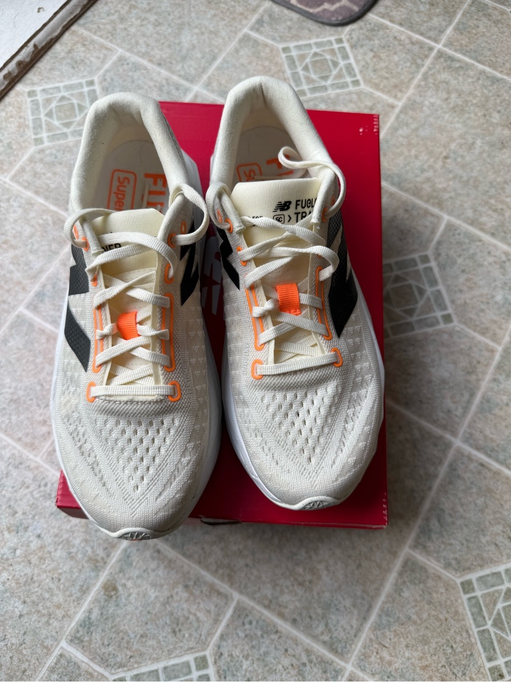 New Balance Women’s Sneakers in Cream with Orange and Black Accents